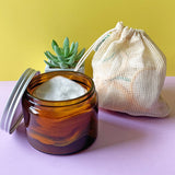 Reusable makeup remover pads in glass jar and cotton wash bag