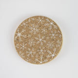 cork coaster with printed snowflake design