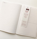 Inside pages and cherry husk bookmark
