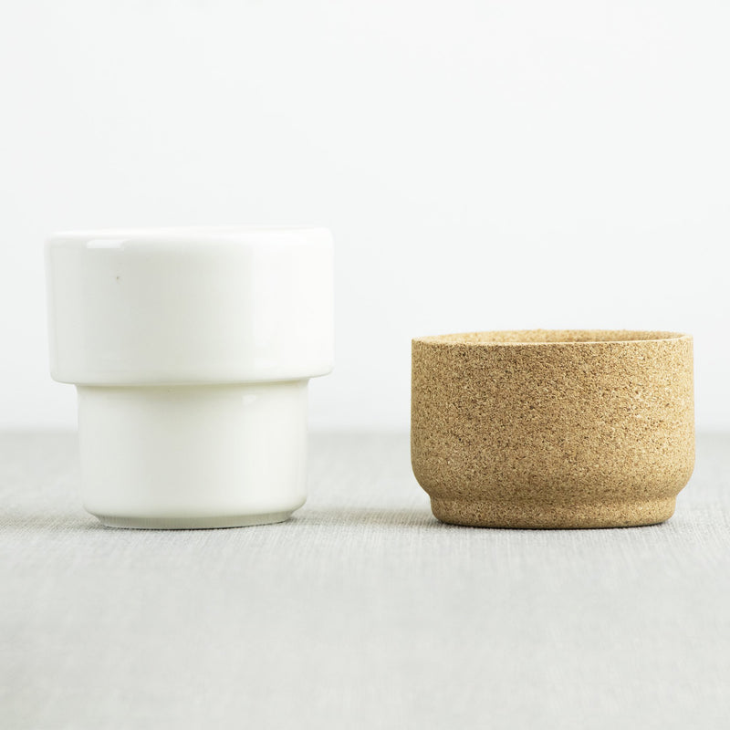 The ceramic and cork parts of the mug shown separately